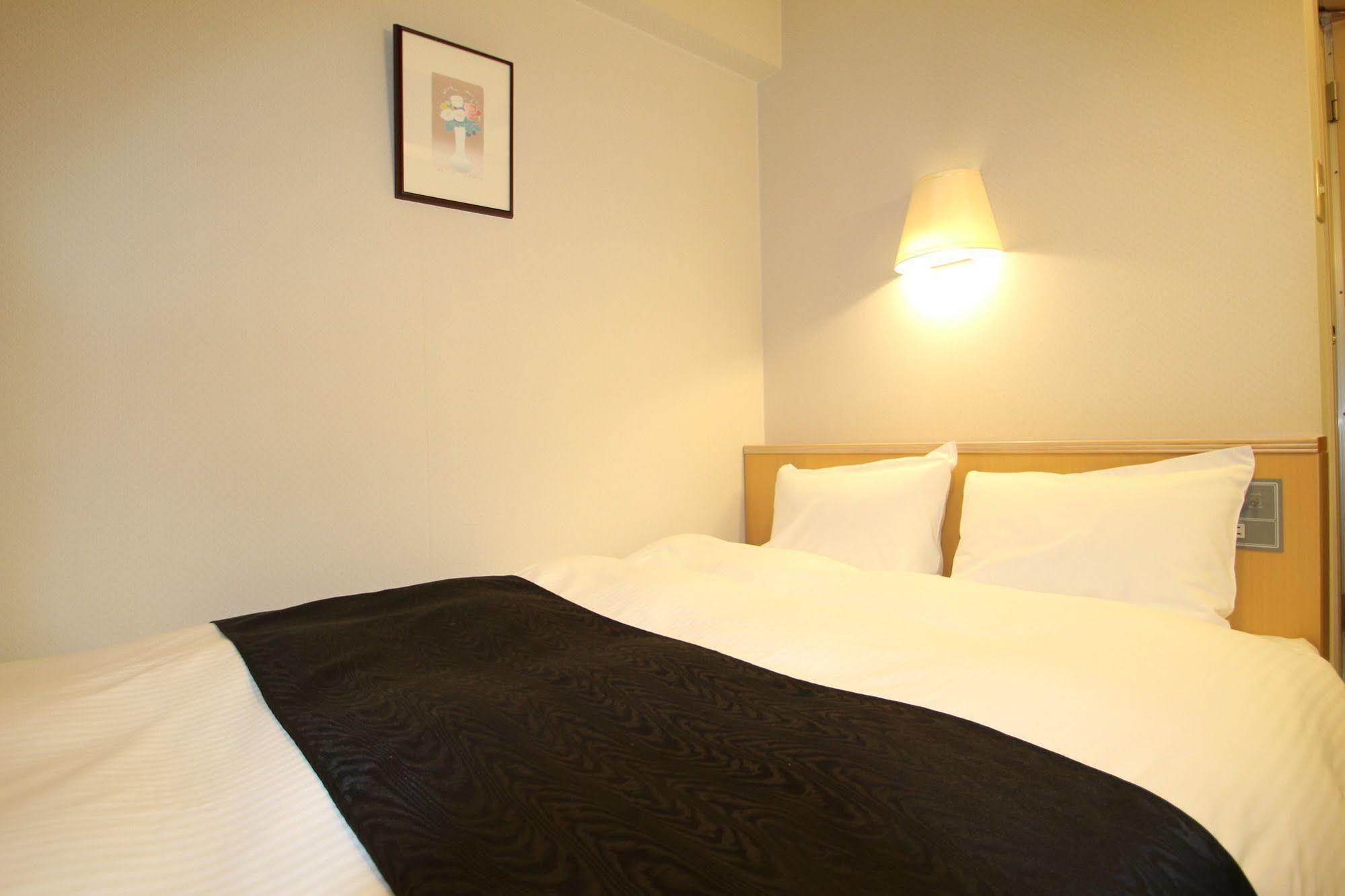 Apa Hotel Tonami Ekimae Ngoại thất bức ảnh